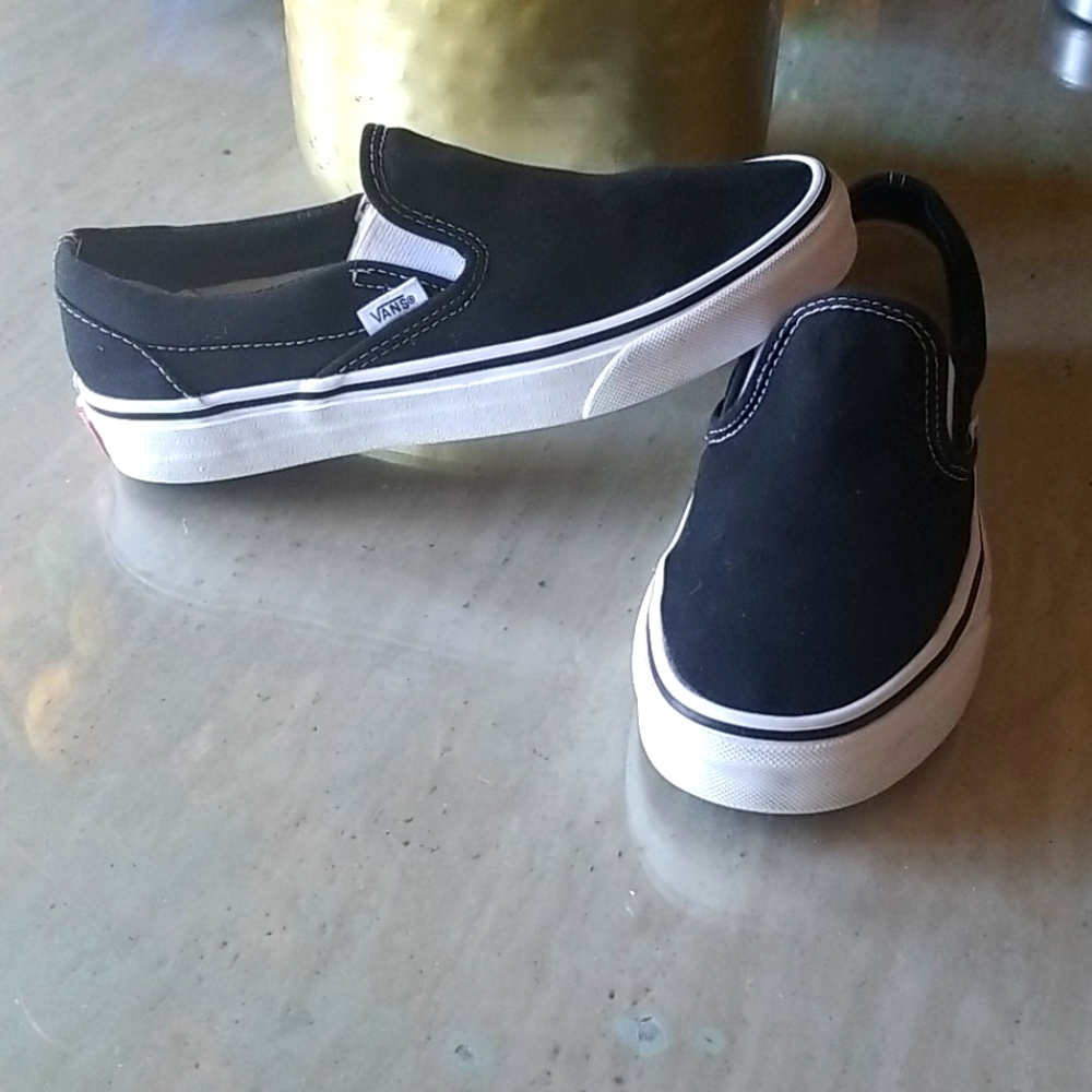 Van's black and white slip on sneakers